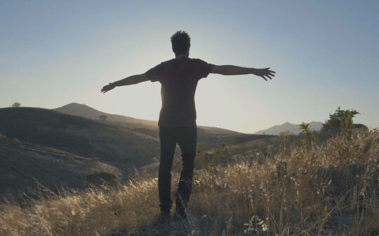 Man Enjoying The Wind 540x337